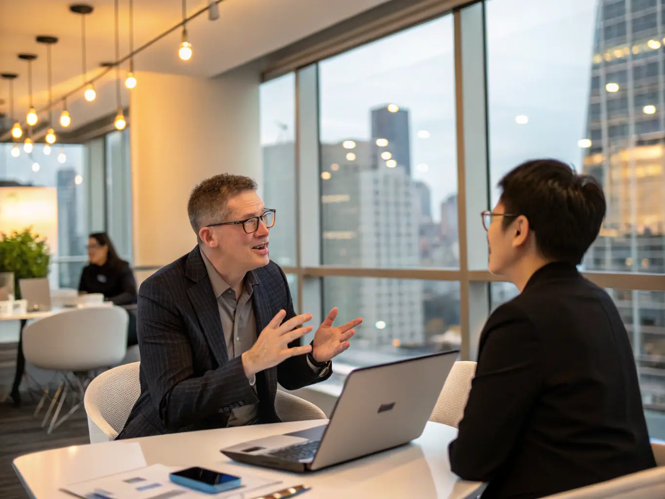 A consultant is presenting a cloud migration strategy to a client in a modern office setting, emphasizing the use of cloud technologies and data analytics.